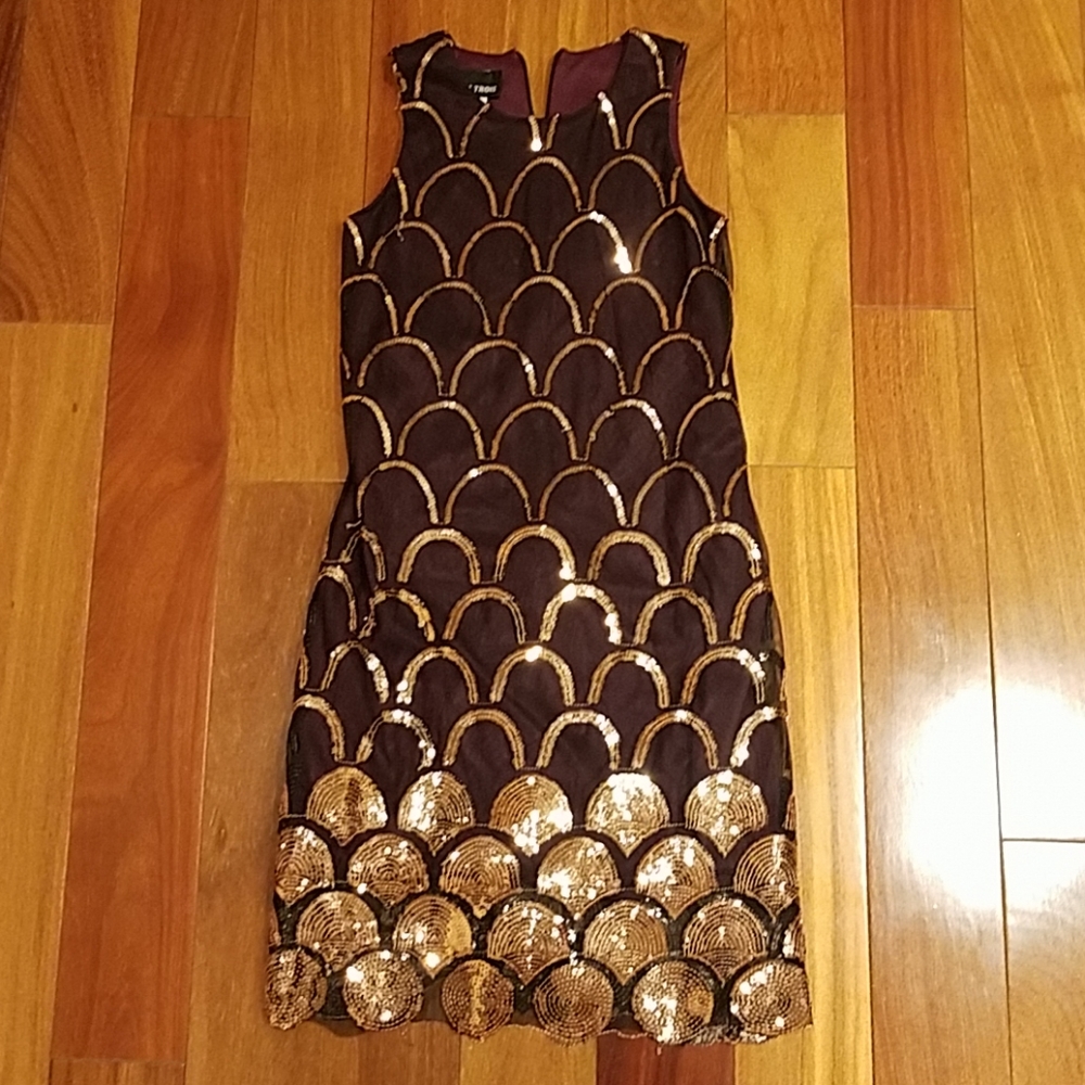 Purple dress with gold sequins.